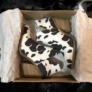Women’s western black & white cowhide booties